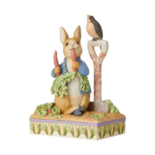 6008743 - Then he ate some radishes (Peter Rabbit Figurine) - Masterpieces.nl